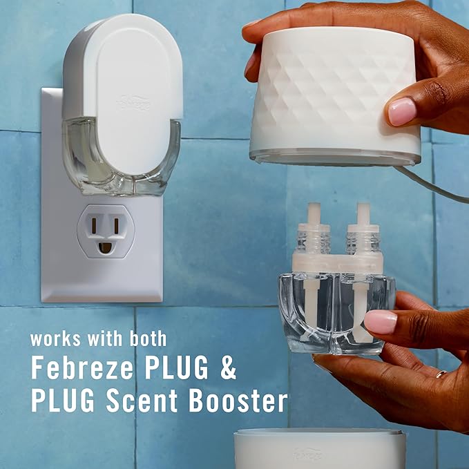 Febreze Plug Scent Booster Starter Kit, Oil Diffuser, Air Freshener Plug in, Continuous Scent, 2 Devices + 2 Baked Cinnamon Apple Refill